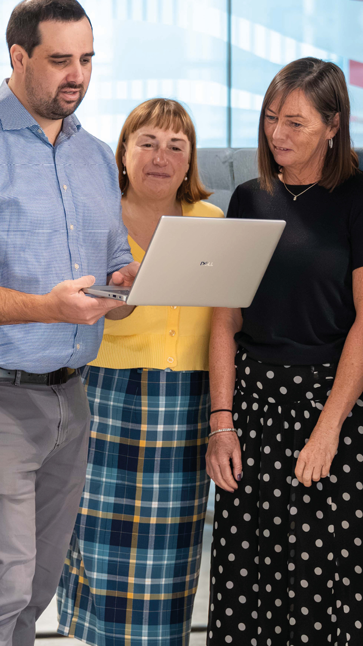 Business services and outsourcing team working together on a client project